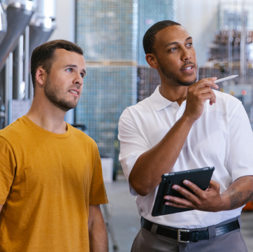 TVA employee speaking with client