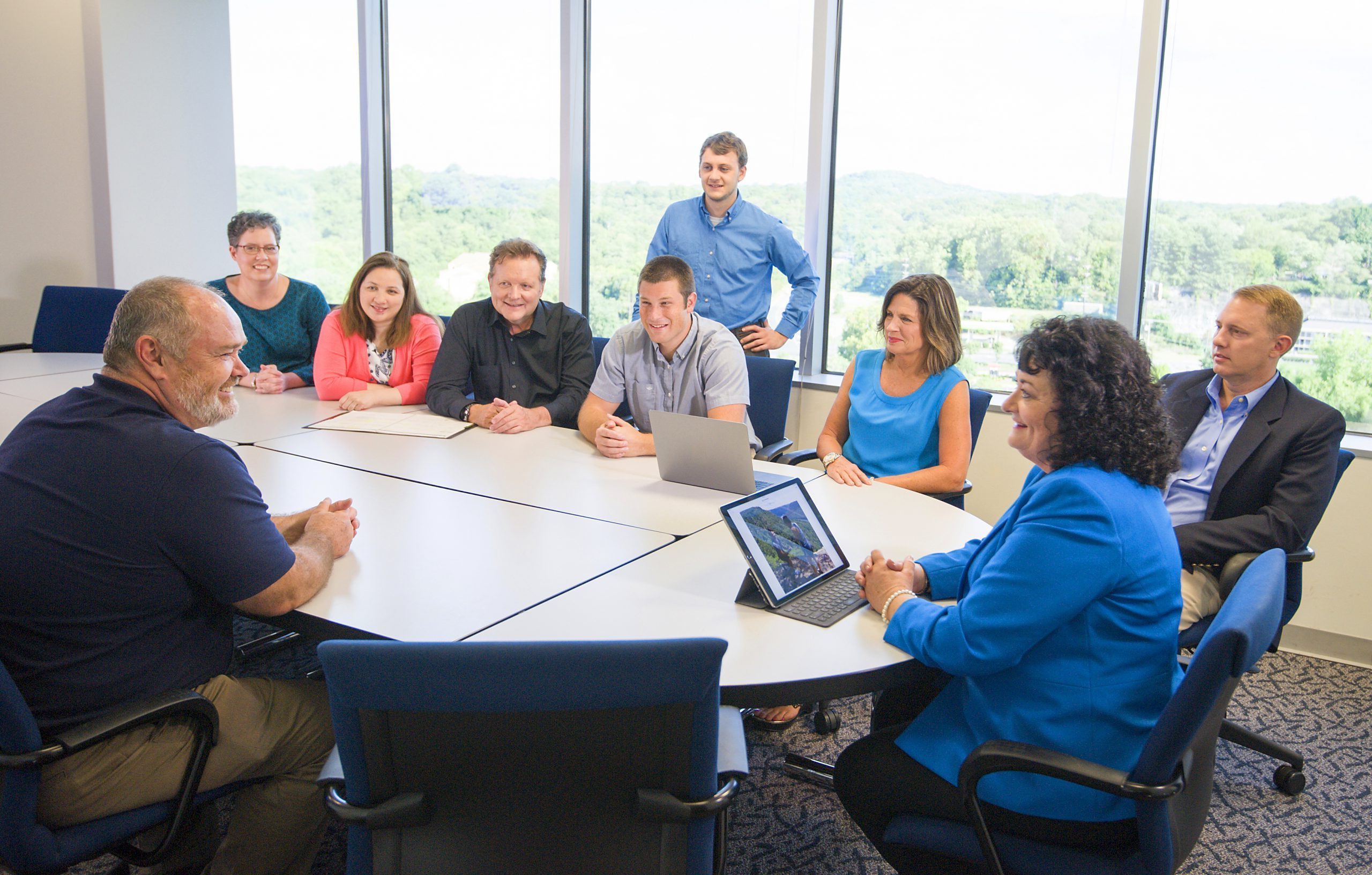 Business people at conference table.