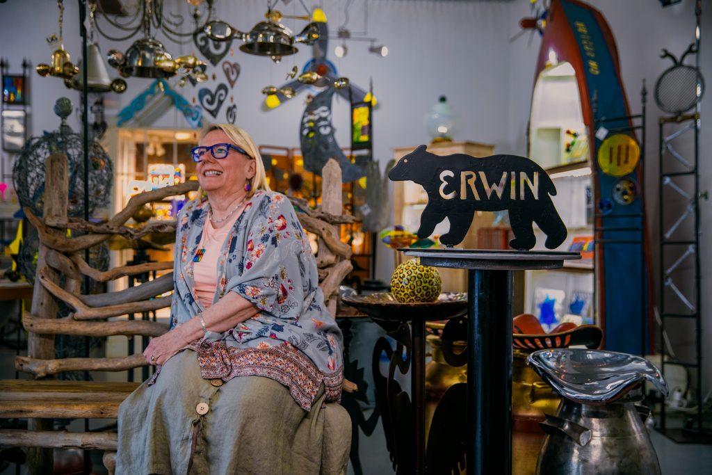 Gallery owner sitting in her shop in Erwin, TN.