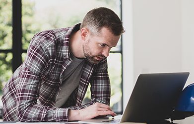 Man looking at laptop