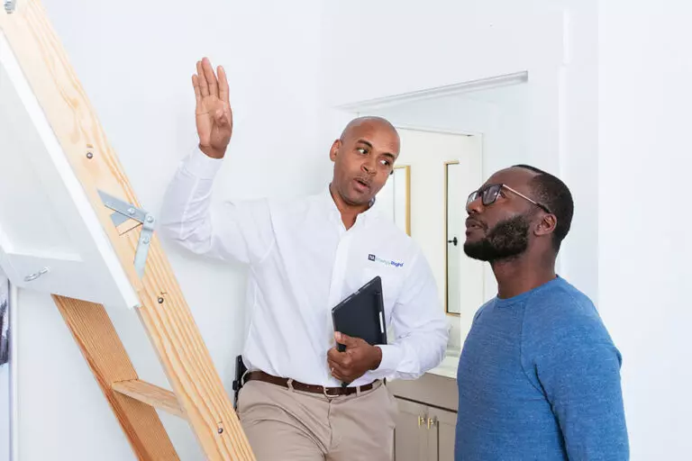 Two men discussing insulation.