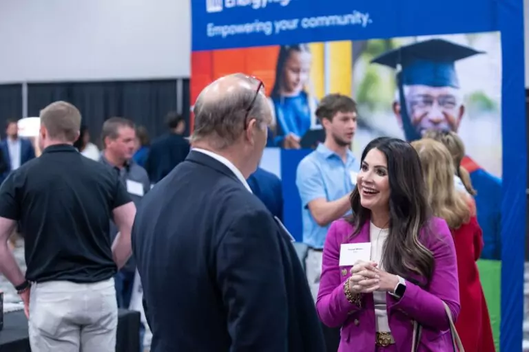 Colleagues connecting at the 2025 summit