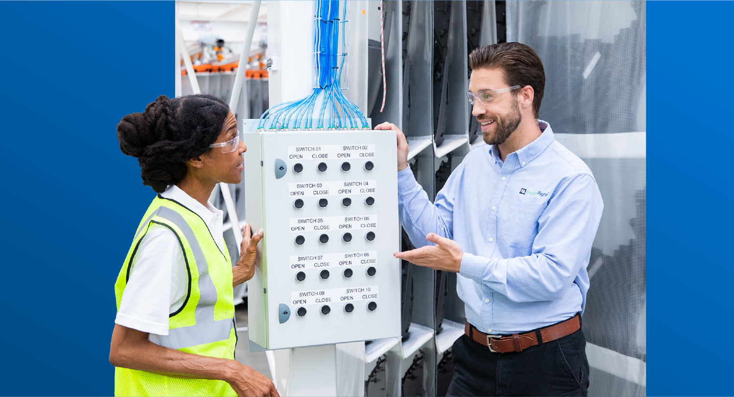 A TVA Energy Expert discusses a multi-switch control panel for energy management with a colleague.