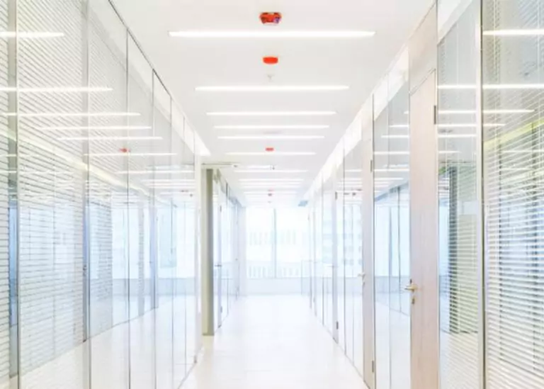 A brightly LED-lit hallway at TriStar Greenview