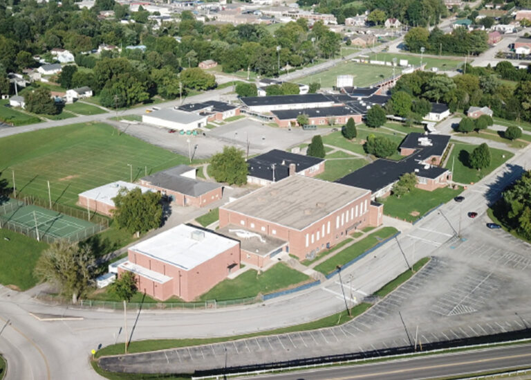 Aerial view of a community school campus, a potential site for TVA EnergyRight efficiency upgrades like LED lighting and heat pump systems.